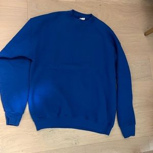 oversized bright blue sweatshirt